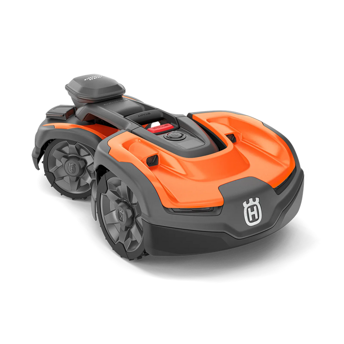 Robotic lawn mower with Husqvarna branding, showcasing its design.