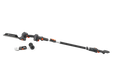 Side view of a Husqvarna pole saw with interchangeable attachments on a white background.