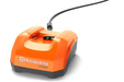 Front view of a Husqvarna C750X battery charger with a power cord.