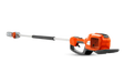 Side view of a Husqvarna battery-powered pole saw, showcasing its extended reach.