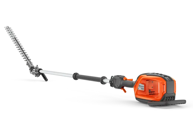 Side view of a battery-powered hedge trimmer with an extended pole.