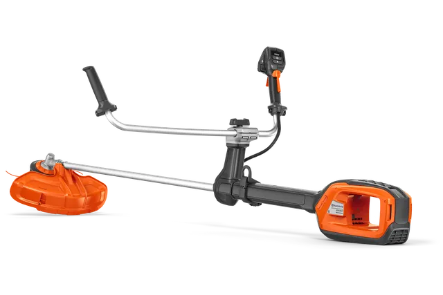 Side view of a Husqvarna brush cutter with ergonomic handle and battery compartment.