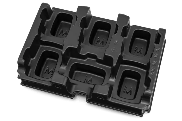 Top view of a molded plastic tray with multiple compartments.