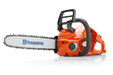 Side view of a Husqvarna chainsaw with visible branding and chain bar.