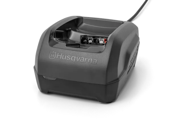 Front view of a Husqvarna battery charger with visible connection ports.