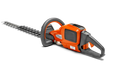Side view of a Husqvarna hedge trimmer with ergonomic handle and cutting blade.