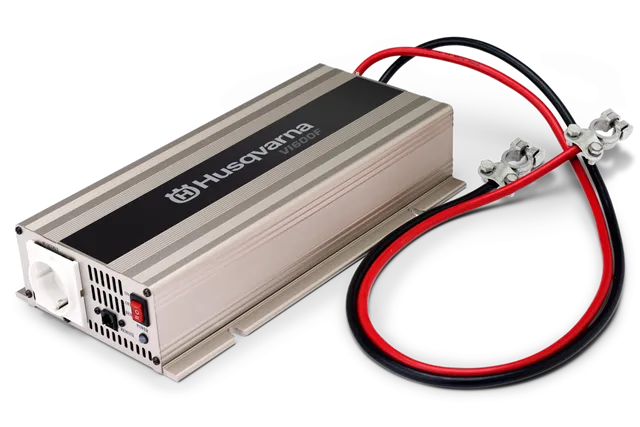 Husqvarna power inverter with attached cables, designed for electrical applications.