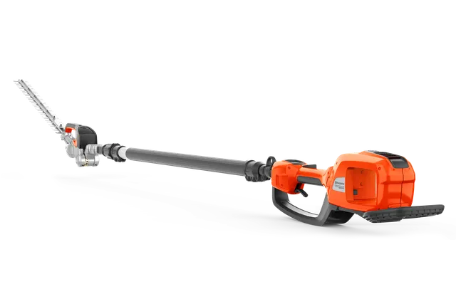 Side view of a Husqvarna battery-powered hedge trimmer with an extended reach.
