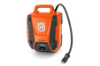 Front view of a Husqvarna BLi950X battery with power cable.