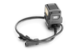 Front view of a Husqvarna battery adapter with a cable attached.
