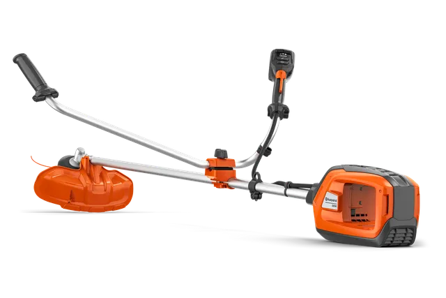 Side view of a Husqvarna brush cutter with ergonomic handle and visible battery compartment.