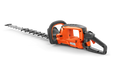 Side view of a Husqvarna hedge trimmer showcasing its ergonomic handle and blade.