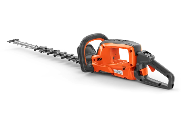 Side view of a Husqvarna hedge trimmer showcasing its ergonomic handle and blade.