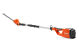 Side view of a Husqvarna battery-powered hedge trimmer with extendable handle.