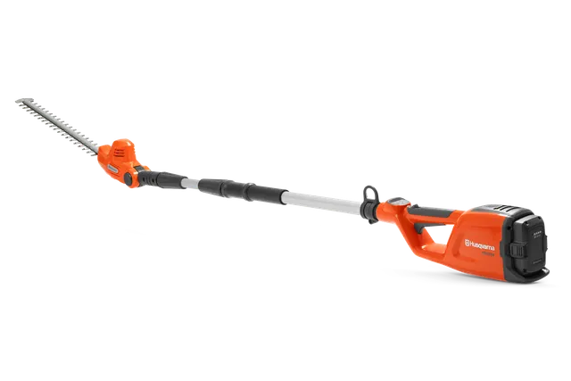 Side view of a Husqvarna battery-powered hedge trimmer with extendable handle.