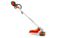 Side view of a Husqvarna string trimmer with visible battery compartment.