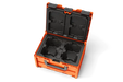 Top view of an open battery case with foam compartments.