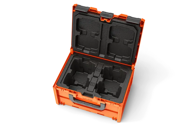 Top view of an open battery case with foam compartments.