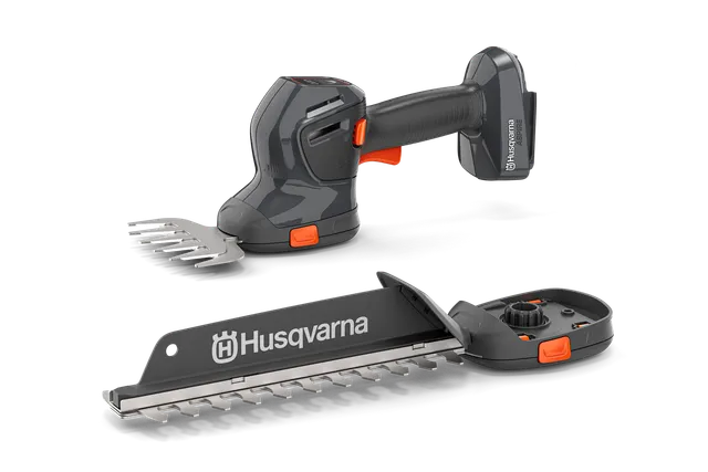 Front view of a Husqvarna handheld gardening tool with interchangeable blades.
