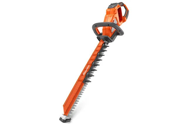 Side view of a Husqvarna hedge trimmer with a long cutting blade.