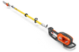 Side view of a battery-powered pole saw with an extended reach for trimming tall branches.
