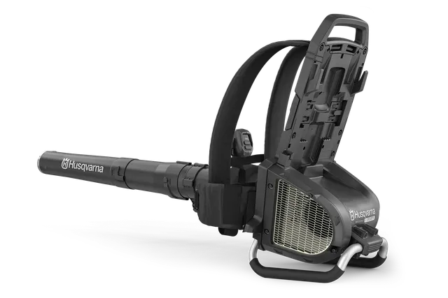 Side view of a Husqvarna leaf blower with open battery compartment.