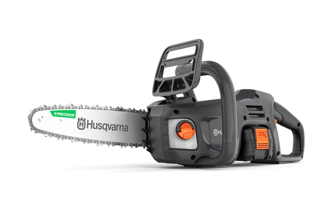 Side view of a Husqvarna chainsaw showcasing its ergonomic handle and control buttons.