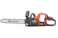 Side view of a Husqvarna chainsaw showcasing its ergonomic handle and design.