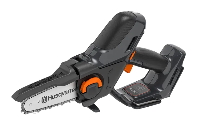 Side view of a Husqvarna chainsaw with ergonomic handle and battery compartment.