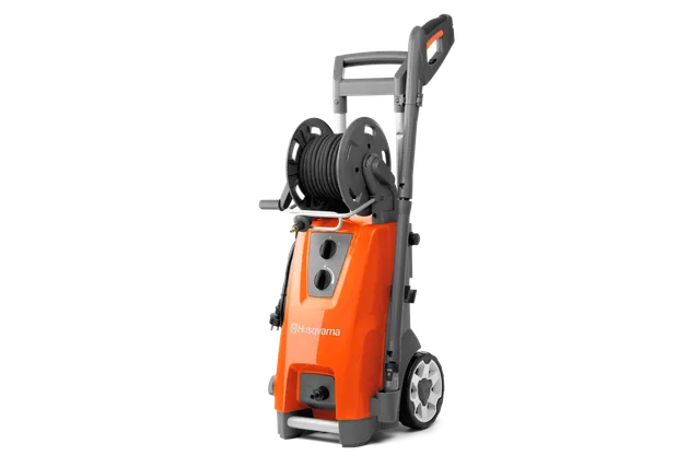 Side view of a Husqvarna pressure washer with hose reel and ergonomic handle.