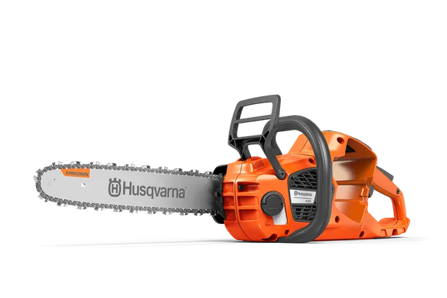 Side view of a Husqvarna chainsaw showcasing its ergonomic design.
