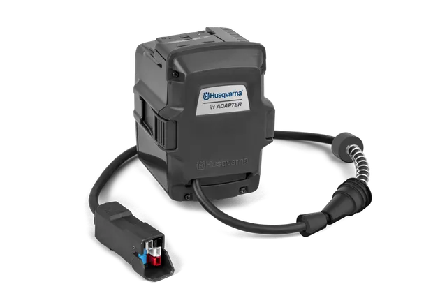 Front view of a Husqvarna iH adapter with connected cables.