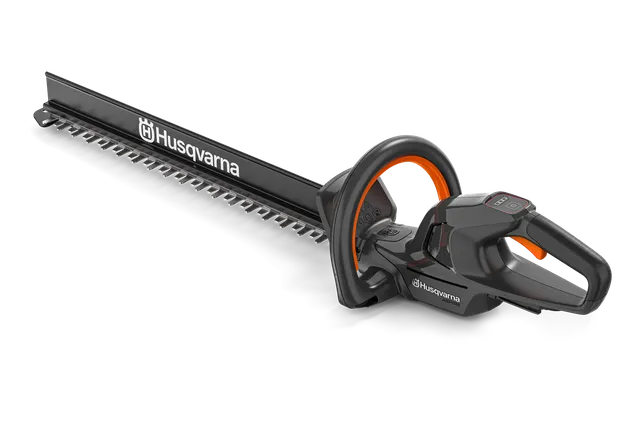 Side view of a Husqvarna hedge trimmer with ergonomic handle.