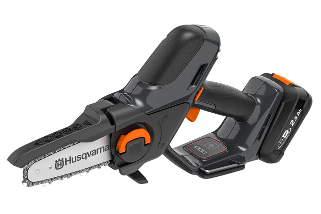 Side view of a Husqvarna battery-powered chainsaw with ergonomic handle.
